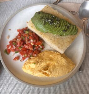 Avocadocado dish with eggs, sliced avocado, and tomato salsa at Ve/La Studio, Thong Lor, Bangkok