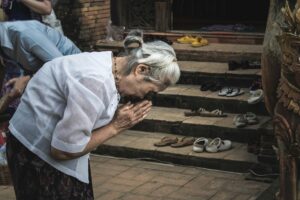 Taking the shoes off to be respectful in Thailand